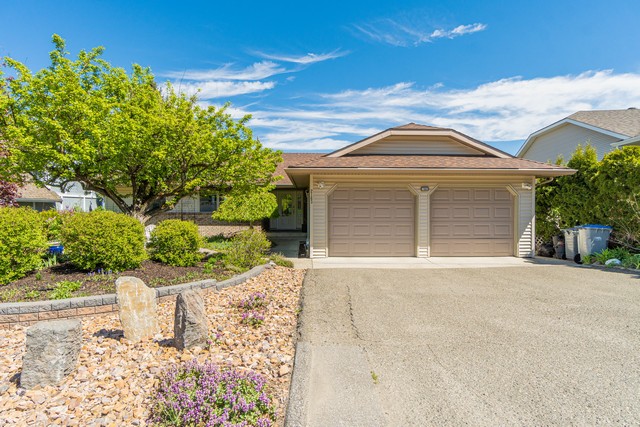 Level Entry Rancher With A Classy Front Garden Patio To Welcome You!   4 Bedrooms & 3 Baths