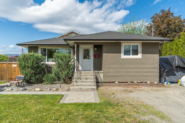 Great Family Home With A Bright Open Floor Plan On An Accessible Corner Lot!  5 Bedrooms & 2 Baths