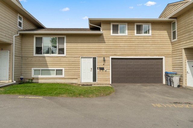 Three Level Split Townhome With Over 1,700 Sqft of Living Space!    4 Bedrooms & 2 Baths