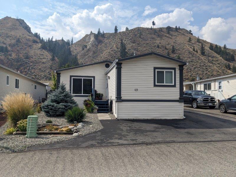 A Hidden Gem, Backing Onto Greenspace & Situated On One Of The Best Lots In The Complex!   3 Bedrooms & 2 Baths