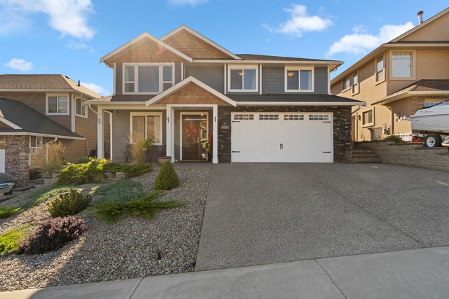 Beautiful Family Home With Bachelor Suite  The Perfect Home For The Growing Family!   4 Bedrooms  & 3 Baths