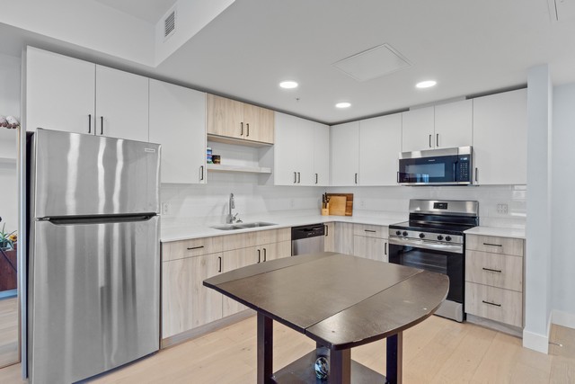 Enjoy Peaceful River Views In Thompson Landing In A Newer Riverfront Condo Development!  1 Bedroom & 1 Bath