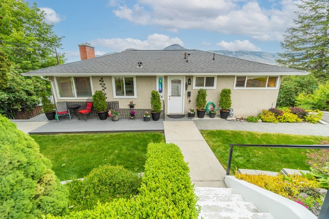 Elegant Character Home On A Quiet Cul De Sac With One Bedroom Suite & Views Over Parks & The North River Valley!  4 Bedrooms & 2Baths