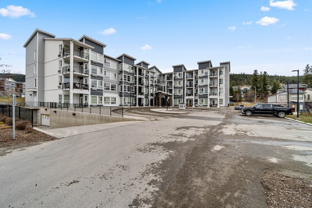 Bright & Beautifully Finished, Featuring An Open Concept Layout! 2 Bedrooms & 2 Baths